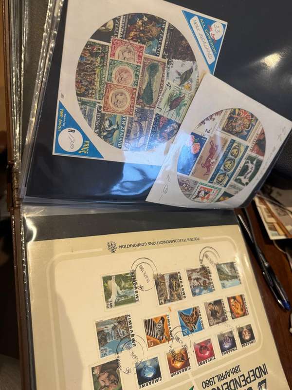 60 page First Day cover holder full of material from all over the world