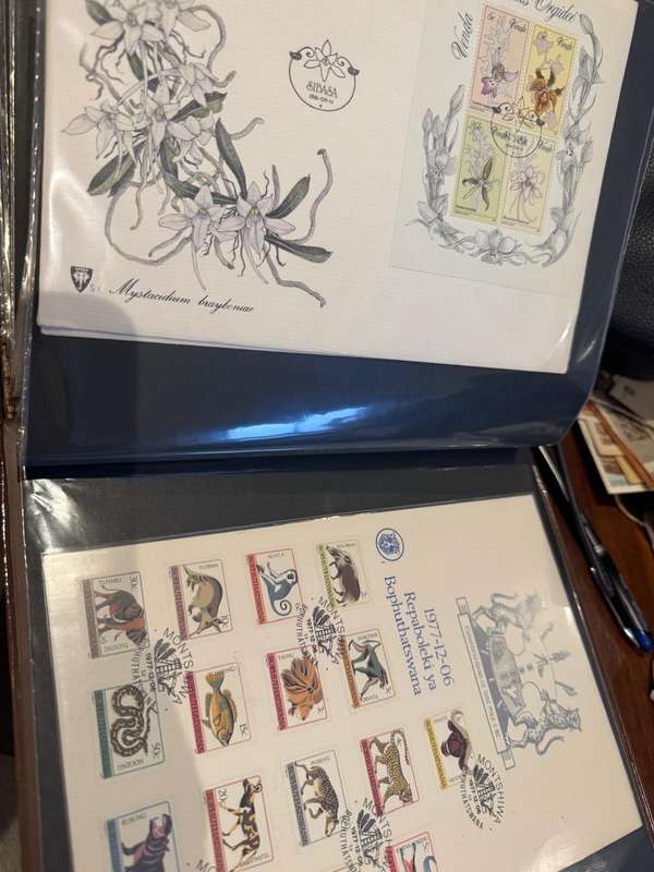 60 page First Day cover holder full of material from all over the world