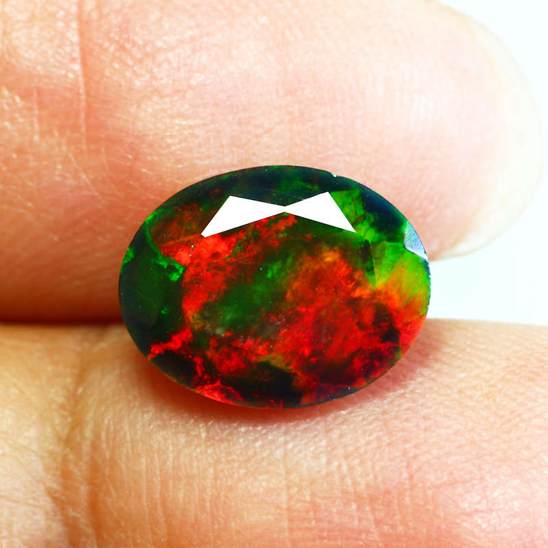 1.86 Ct. IF Fantastic Oval cut 11x9 mm 3D MulticolorDisco Black Fire Opal