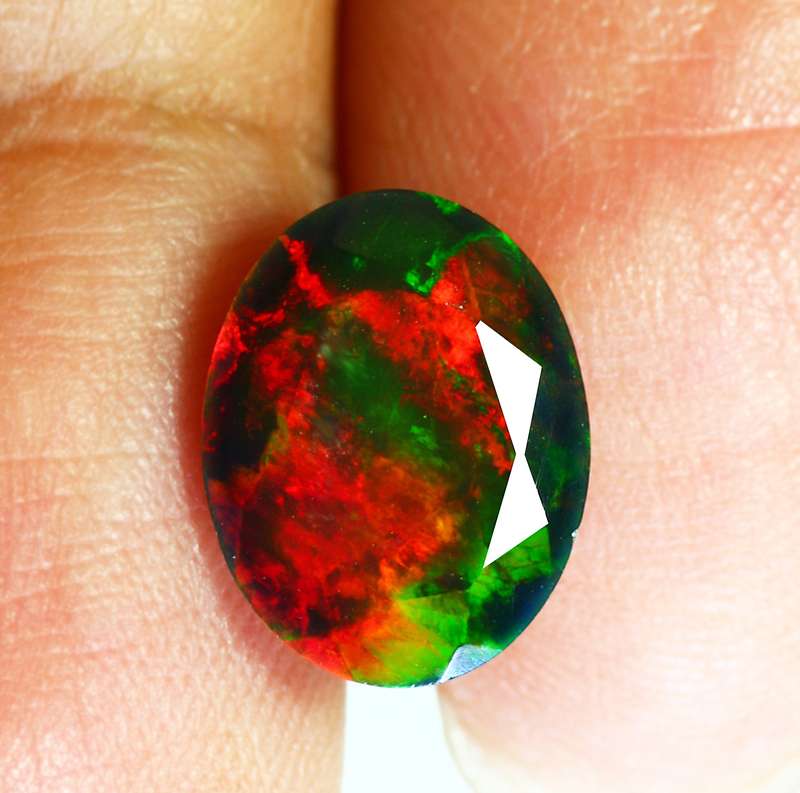 1.86 Ct. IF Fantastic Oval cut 11x9 mm 3D MulticolorDisco Black Fire Opal