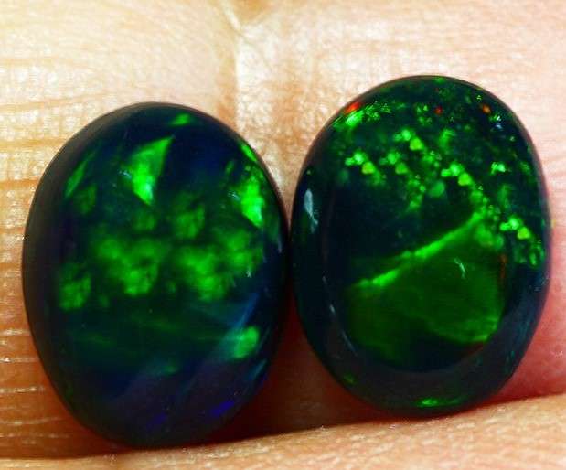 2.17Ct. Eye-opening Oval cut 9 x 7 mm Multi color Flashing Black Fire Opal