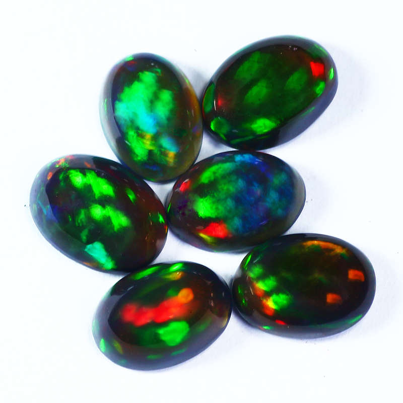 3.14 Ct. Splendid Oval cut 7 x 5 mm Multi Color Play Black Fire Opal