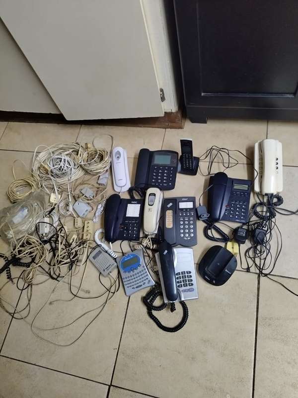 bargain bin mixed lot of landline phones adsl fittings and routers