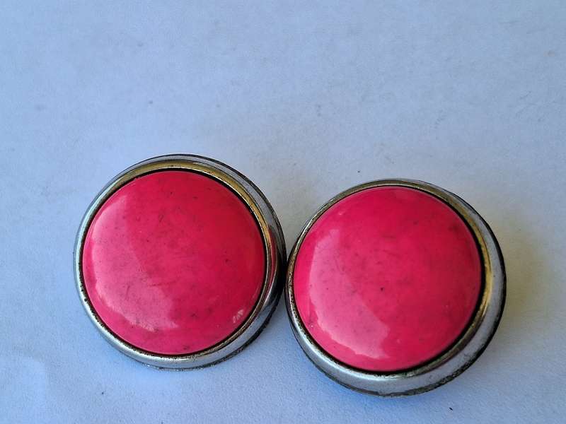 Large pink clip on earringd