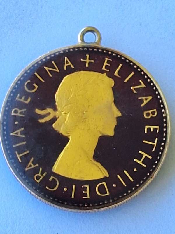 1957 British one shilling pendant