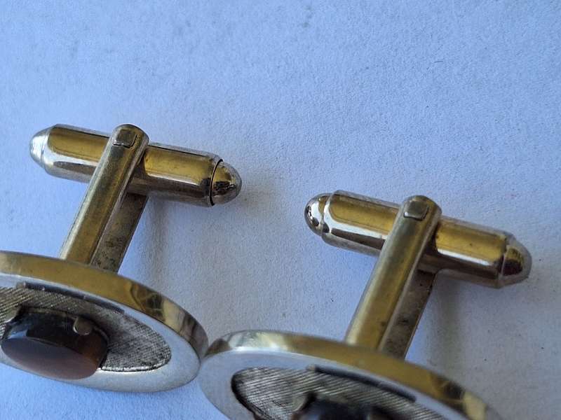 Cuff links with tigers eye center
