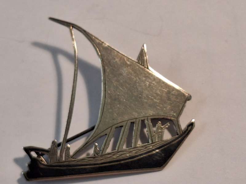 Sail boat brooch