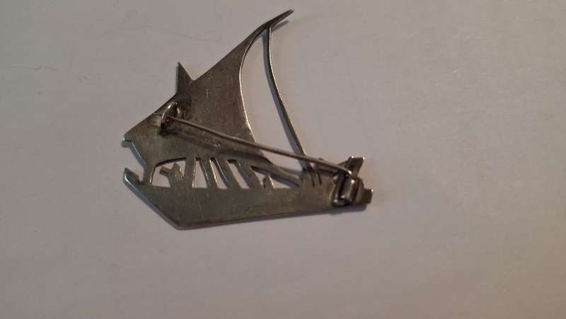 Sail boat brooch