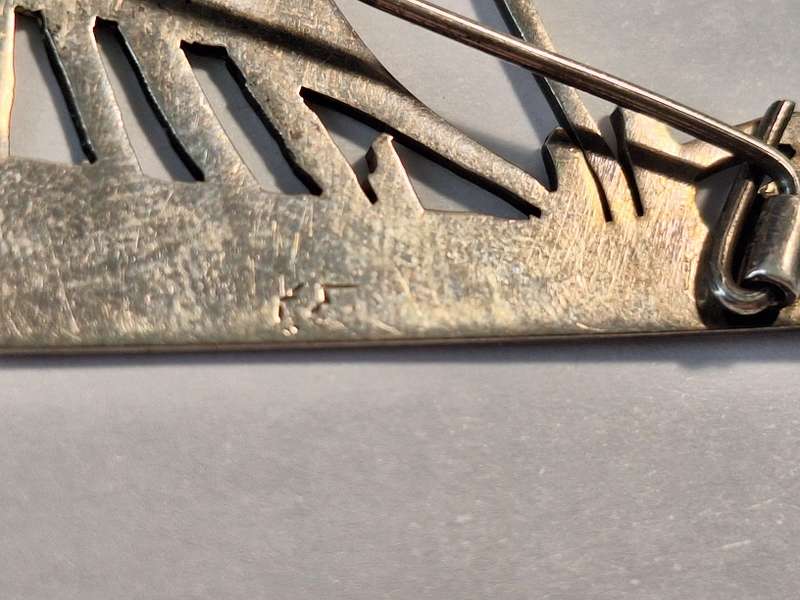 Sail boat brooch