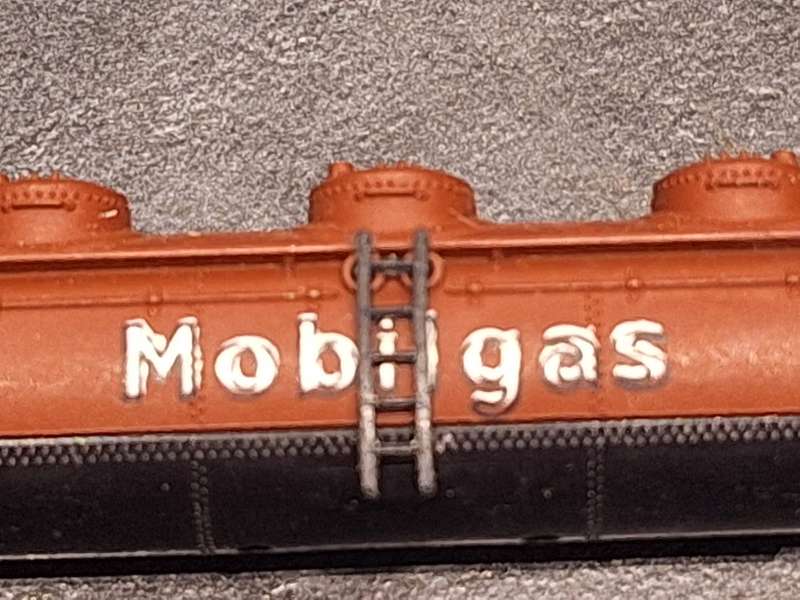 Collection of Hotwheels cars and unmatched train pieces