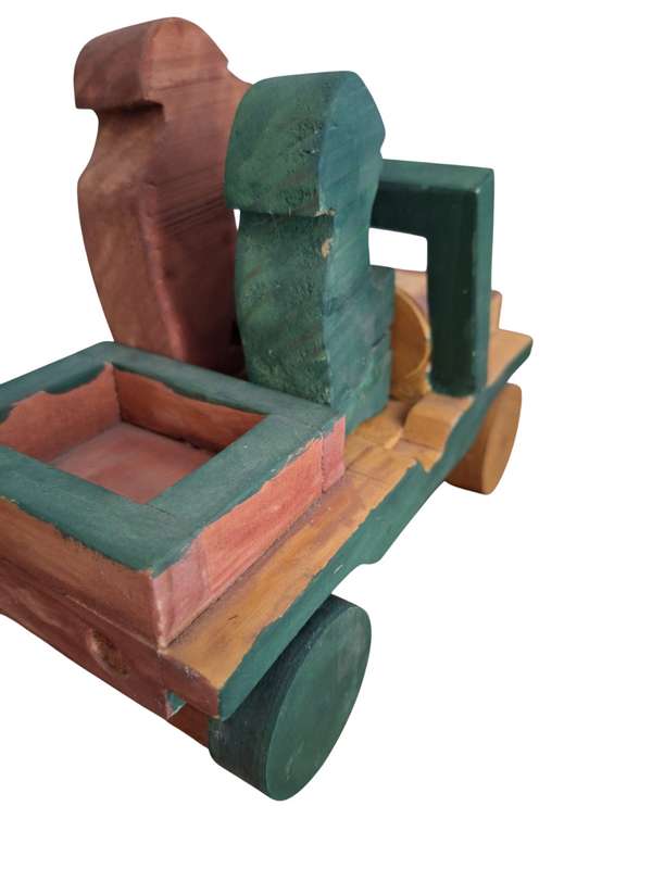 Vintage handmade wooden truck with dogs