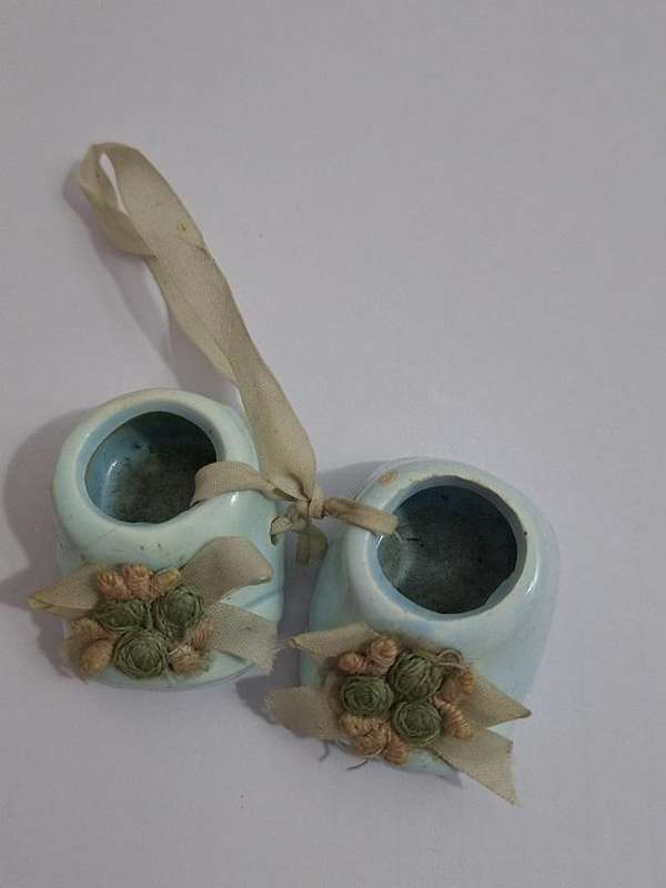 Vintage miniature ceramic baby shoes