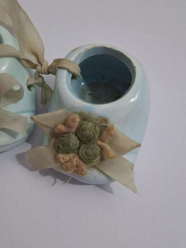 Vintage miniature ceramic baby shoes