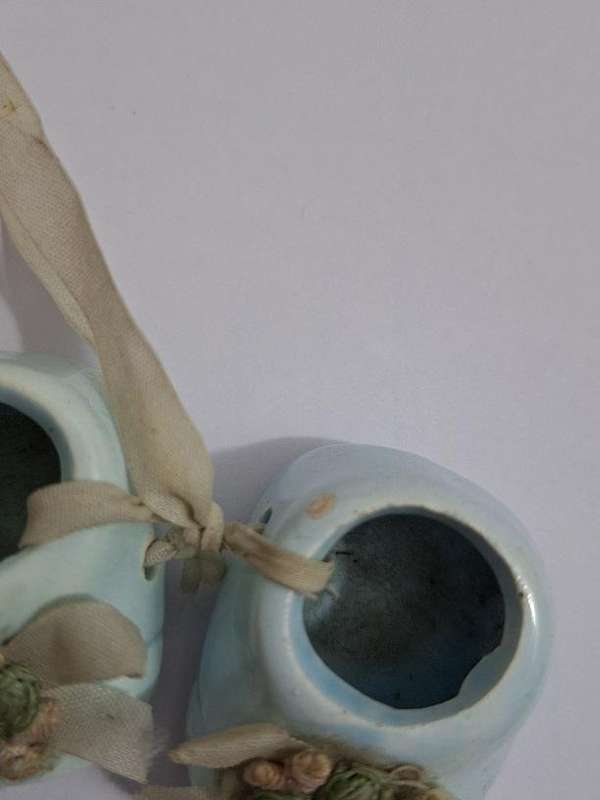 Vintage miniature ceramic baby shoes
