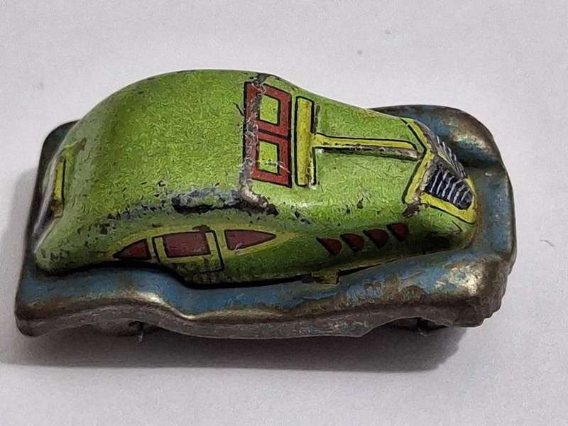 Vintage miniature tin toy car circa 1940s