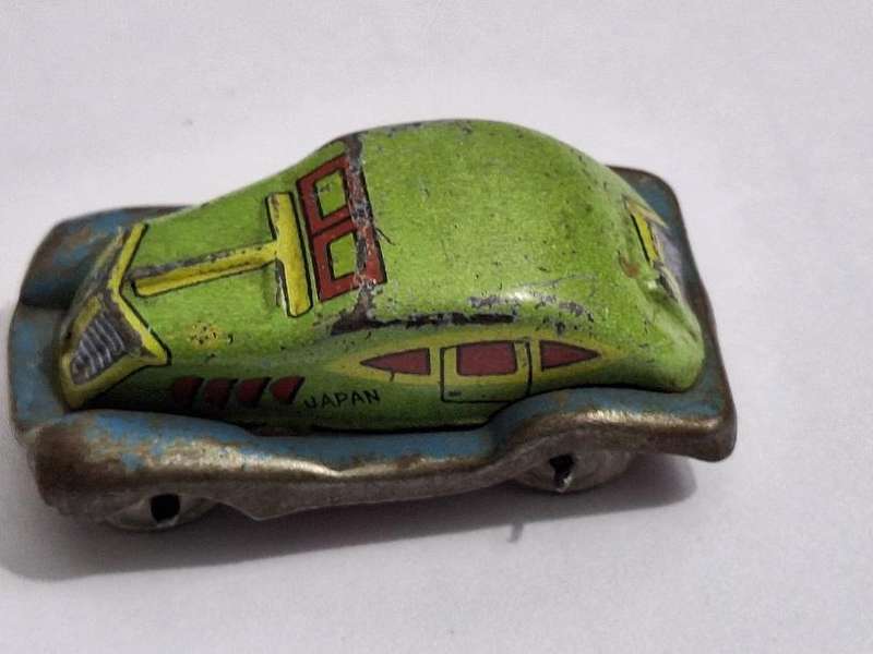 Vintage miniature tin toy car circa 1940s