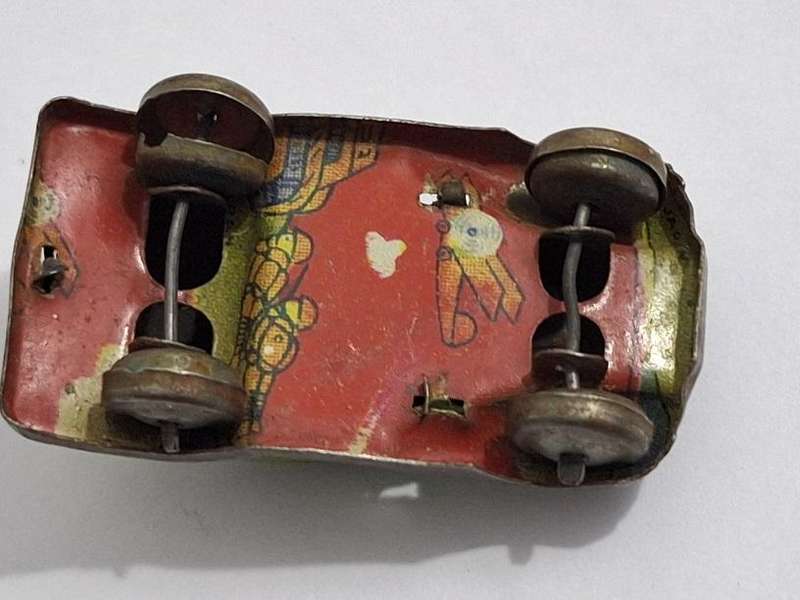 Vintage miniature tin toy car circa 1940s