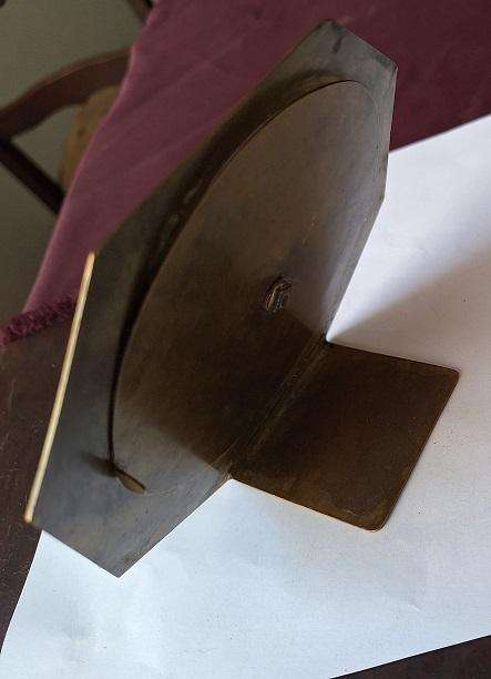 Vintage brass 50 year perpetual calendar, depicting the Voortrekker monument