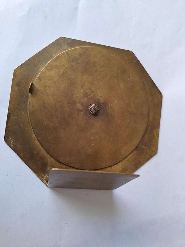 Vintage brass 50 year perpetual calendar, depicting the Voortrekker monument