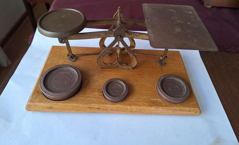 Vintage postal scale with weights