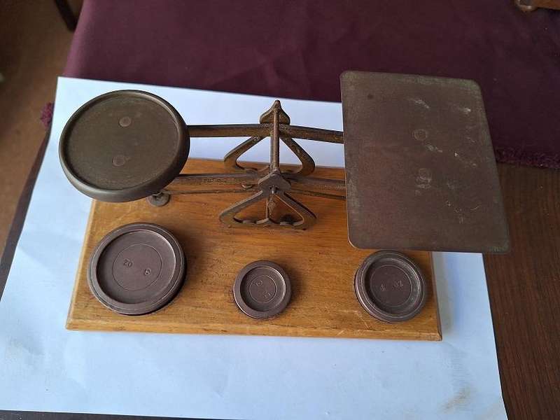 Vintage postal scale with weights