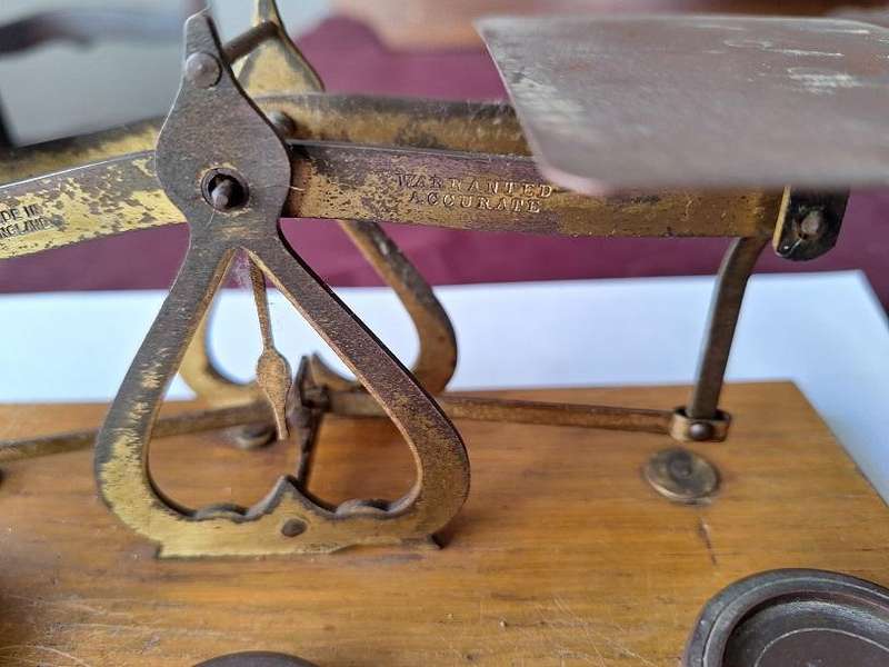Vintage postal scale with weights