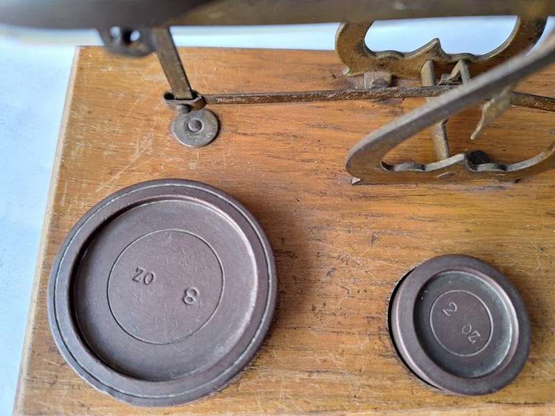 Vintage postal scale with weights