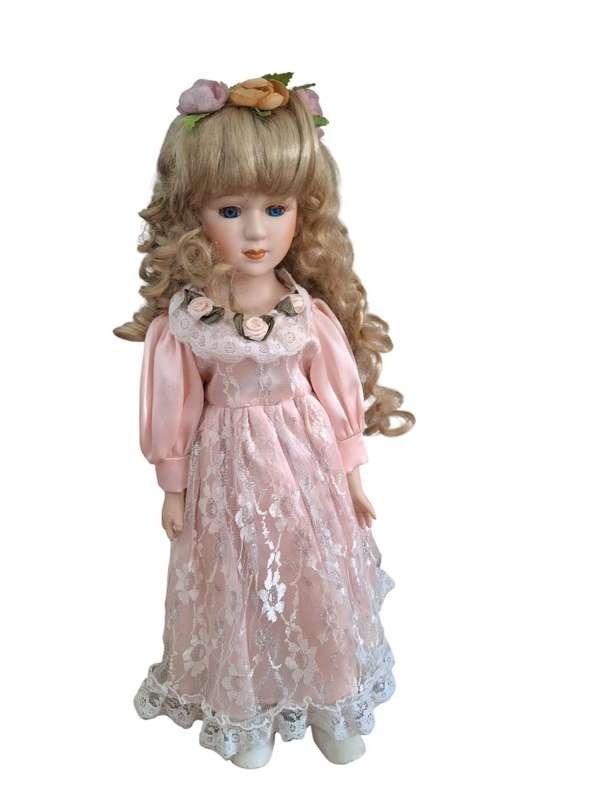 Stunning vintage porcelain doll to add to your collection with stand