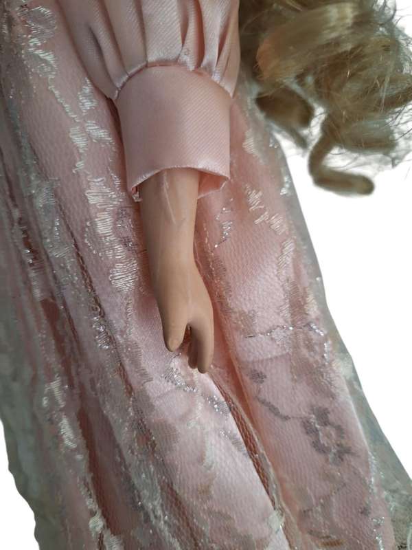 Stunning vintage porcelain doll to add to your collection with stand