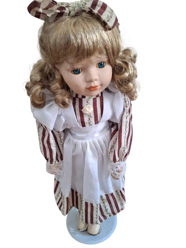 Vintage Porcelain doll 41cm high with stand