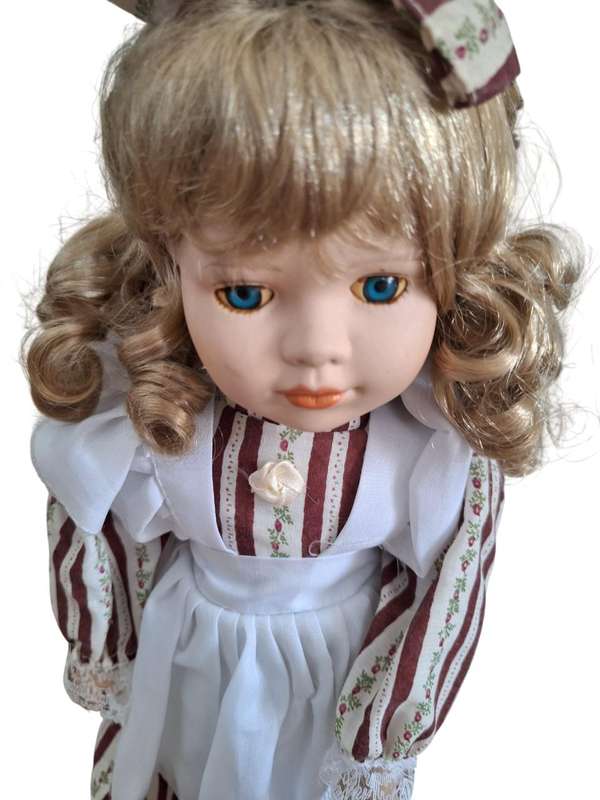 Vintage Porcelain doll 41cm high with stand