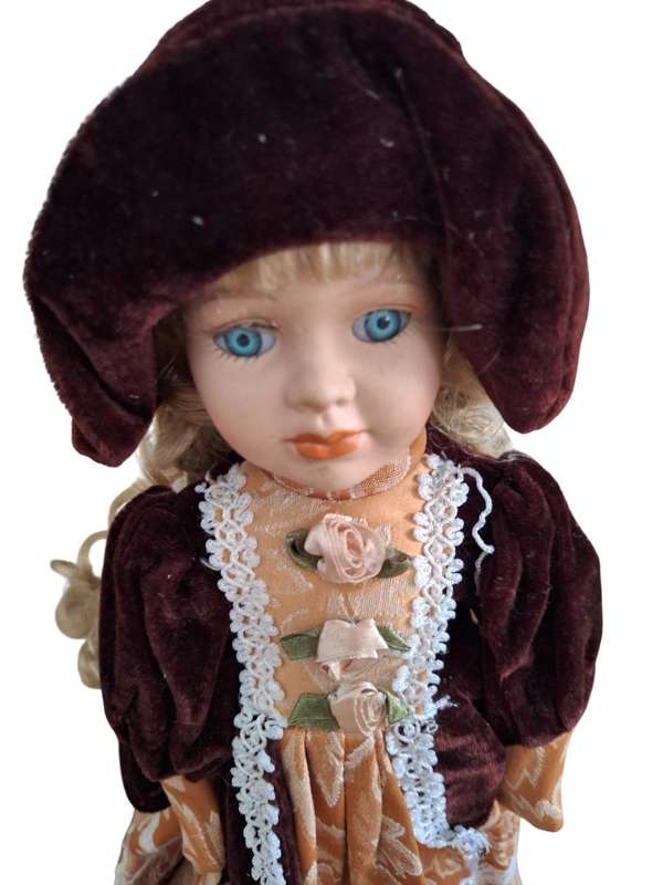 Vintage Porcelain doll 41cm high with stand