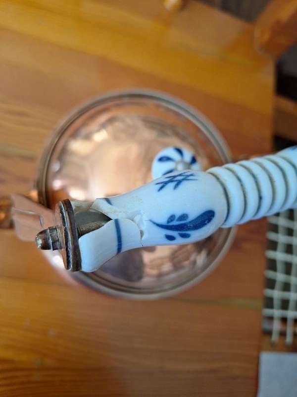 Vintage copper kettle with porcelain handle