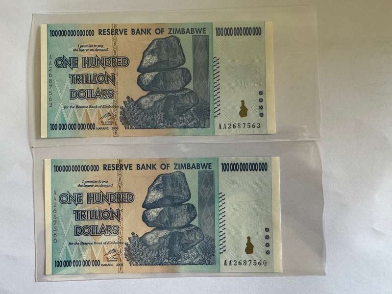 Two Authentic 100 Trillion Zimbabwe Banknotes