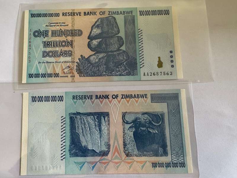 Two Authentic 100 Trillion Zimbabwe Banknotes