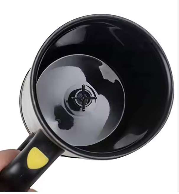 Self stirring mug