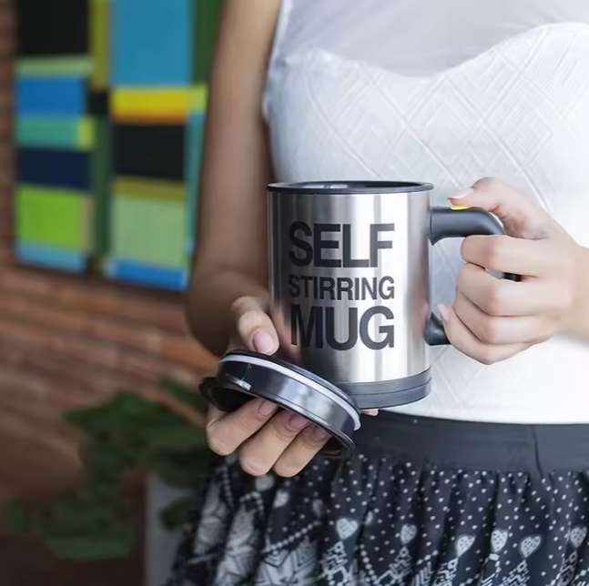 Self stirring mug