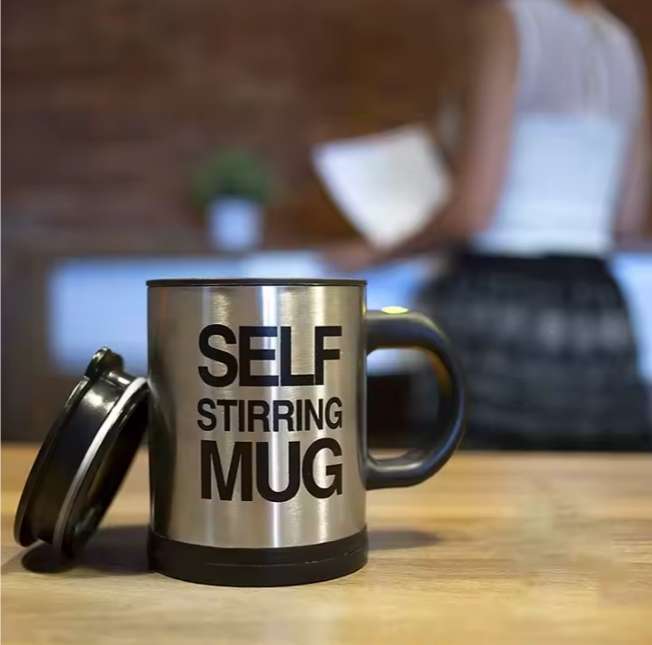 Self stirring mug