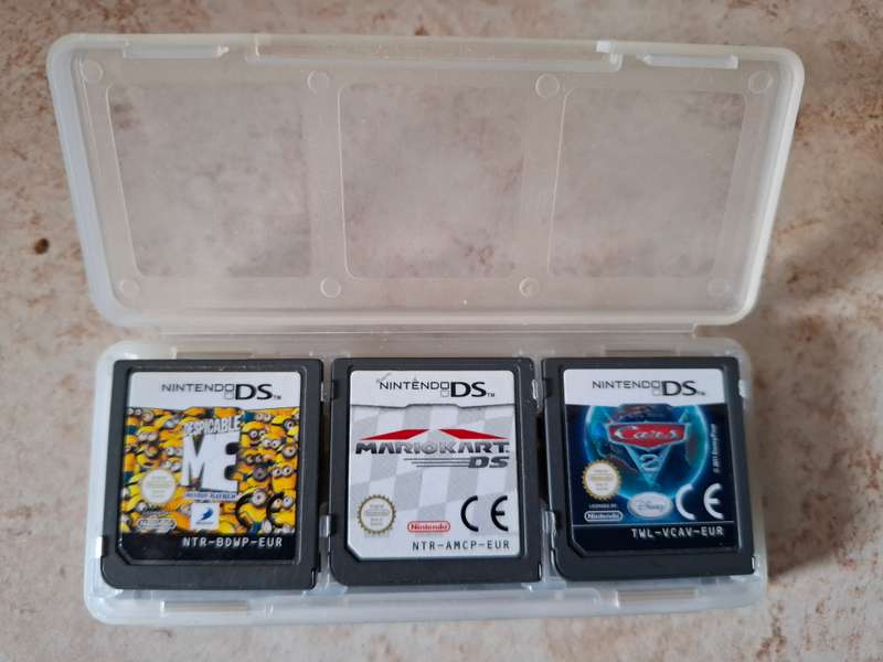 Nintendo DSi XL & 9 Games