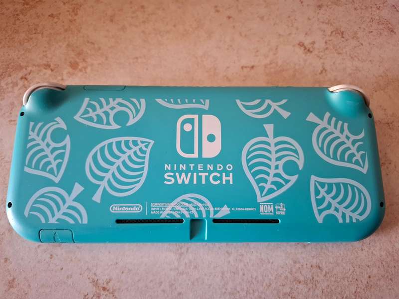Nintendo Switch Lite (Animal Crossing - Timmy & Tommy's Aloha Edition)