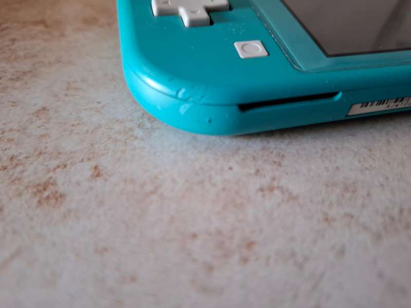 Nintendo Switch Lite (Animal Crossing - Timmy & Tommy's Aloha Edition)