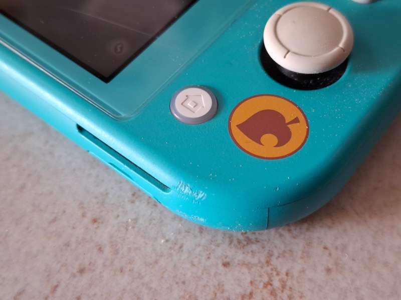 Nintendo Switch Lite (Animal Crossing - Timmy & Tommy's Aloha Edition)