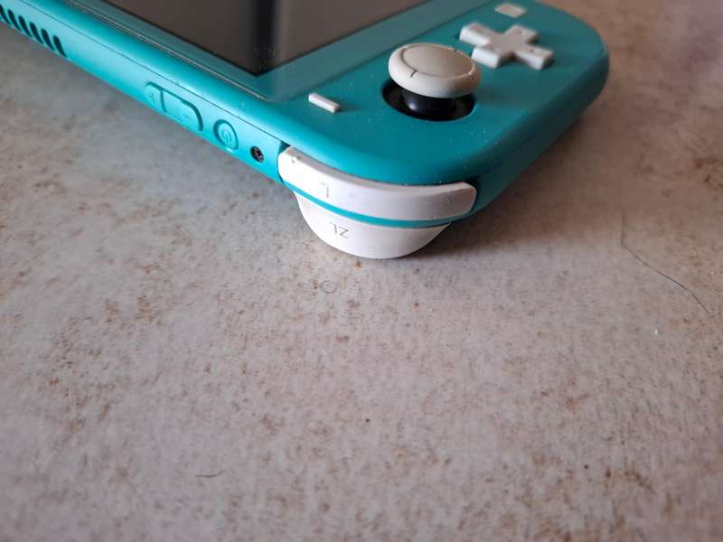 Nintendo Switch Lite (Animal Crossing - Timmy & Tommy's Aloha Edition)
