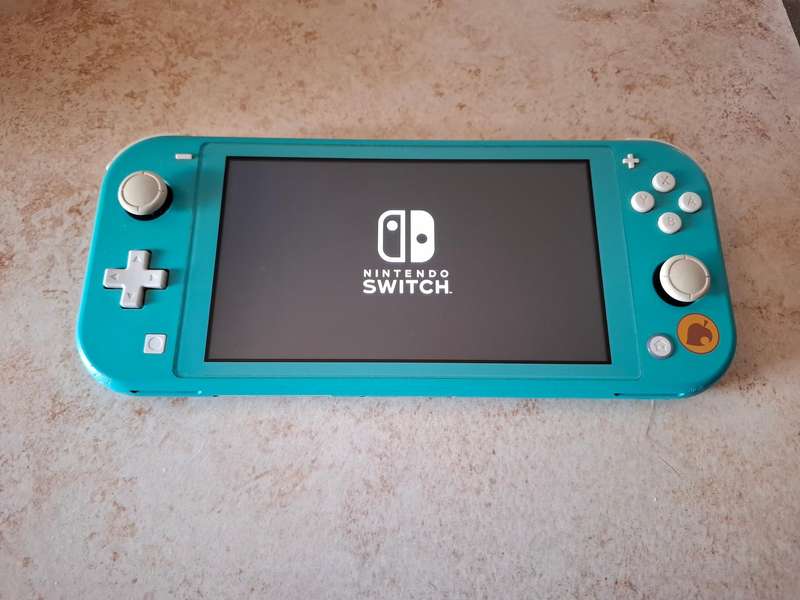 Nintendo Switch Lite (Animal Crossing - Timmy & Tommy's Aloha Edition)