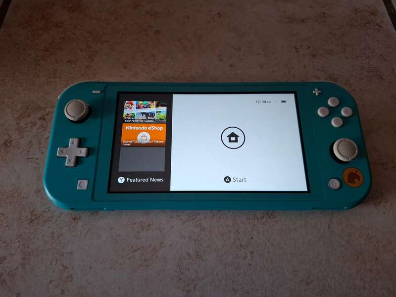Nintendo Switch Lite (Animal Crossing - Timmy & Tommy's Aloha Edition)