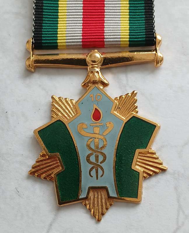SA Noodhulpliga Medal Group - named
