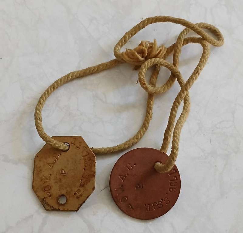 Dog Tags, pair  Issued to: S.Sgt Low
