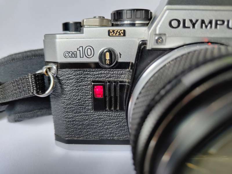Olympus OM10 and Olympus T32 Flash with accessories