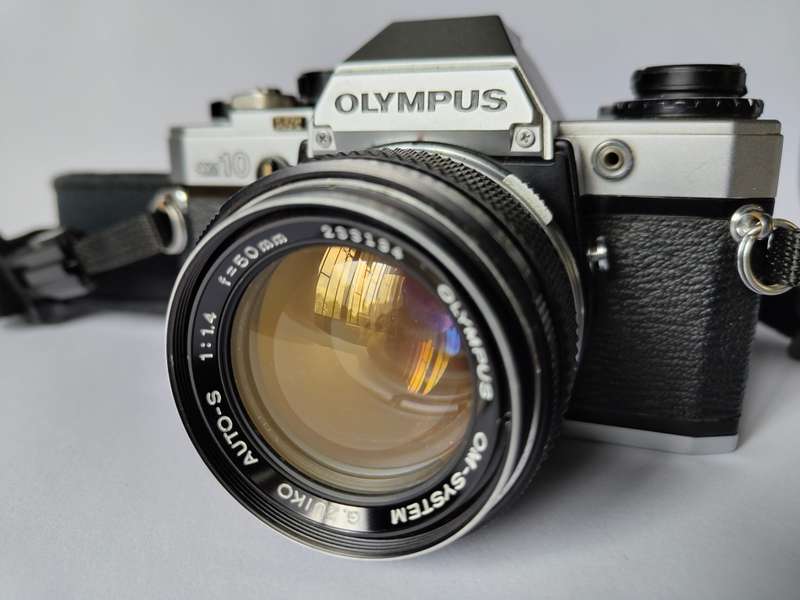 Olympus OM10 and Olympus T32 Flash with accessories