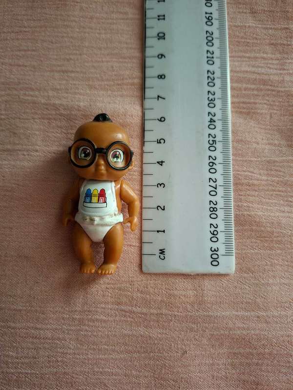 Headstart Baby Secrets doll with glasses